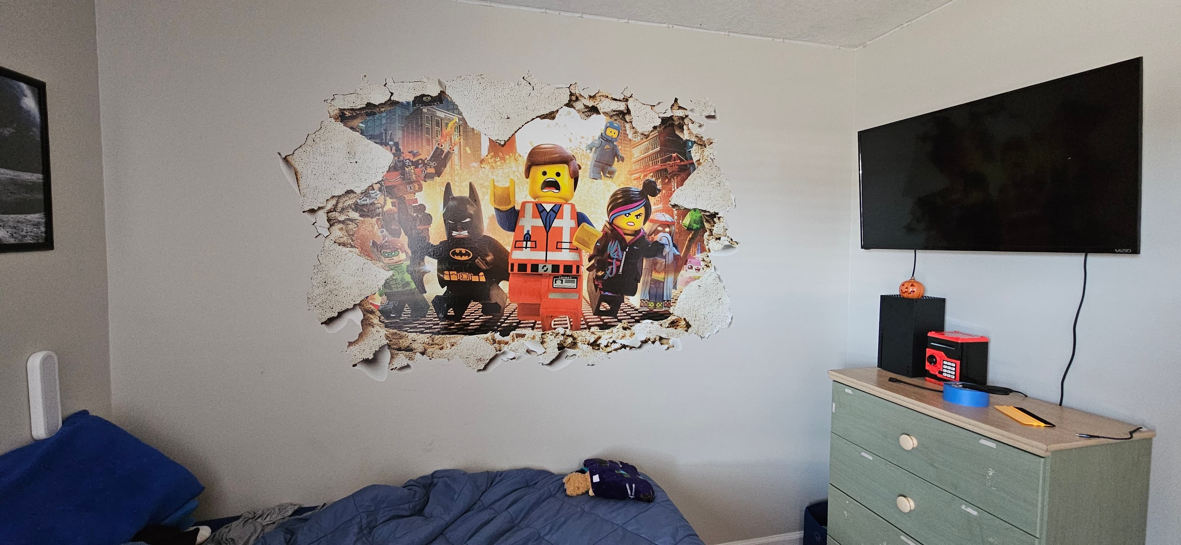 Custom Lego-themed wall decal printed and laid flat before installation